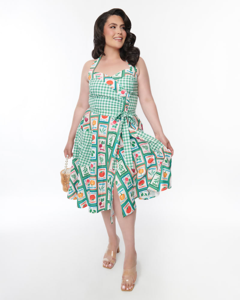 Front of a model wearing a size 1X Unique Vintage Green Vegetable & Gingham Wrap Swing Skirt in Green by Unique Vintage. | dia_product_style_image_id:298515